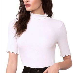 white turtle neck shirt